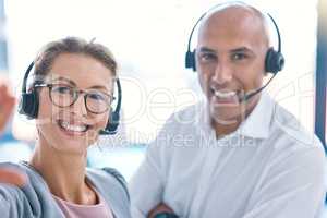 Selfie of call center operator, marketing agent and sales consultants on webcam video call in an office. Friendly, smiling and helpful support staff consulting contact us hotline for customer service