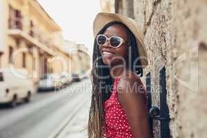 I have always loved to travel. a beautiful young woman spending her day out exploring a foreign city.