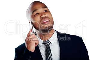 Determined to connect with all the right clients. Studio shot of a handsome young businessman on a call against a white background.