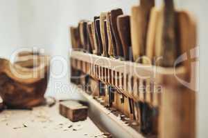 Whittling awayWoodwork is the best work. the inside of a craftsmans workshop.
