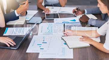 Sales, budget and finance business people, manager or accountants in meeting planning, analyzing and discussing paper work, charts and graphs data. An accounting company working on commerce analysis