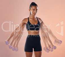 Fitness, workout and training female athlete lifting weights or dumbbells in a studio to stay healthy, active and strong. Wellness, cgi and young woman doing a side lateral raise exercises, portrait