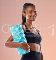 Foam roller for fit athlete to massage sore muscles after workout, training and exercise against colorful studio background, Portrait of a toned, smiling and active young woman with healthy lifestyle