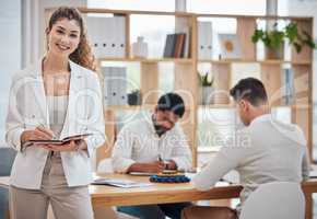 Proud, portrait and professional taking notes in the office. Assertive, friendly and working lady in corporate company. Writing, feedback and team manager or strategy at business meeting with ceo.