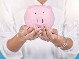 . Piggybank, future investment and money in hands of female bank manager doing finance planning. Closeup of an accountant holding cash savings. Woman with a financial growth budget during inflation.