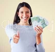 Thumbs up, money and finance growth with cash, bank notes and currency after investment, savings and lottery win. Portrait of excited, happy or motivated woman approving wealth, budget or development