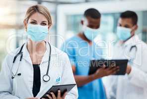 Doctor in covid hospital browsing on tablet for test result, patient records and medical research. Portrait of healthcare professional, phd expert and woman working on treatment cure for flu pandemic