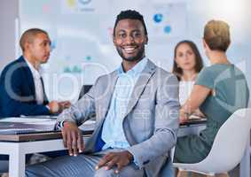 Leadership, innovation and vision of a smiling business man leading a meeting in a modern office. Leader, professional and empowered man discussing innovative strategies, marketing and planning.