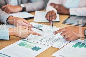 Financial, marketing or strategy business meeting with group of formal work colleagues in boardroom conference. Closeup of team of professional employees working on data analysis report on company