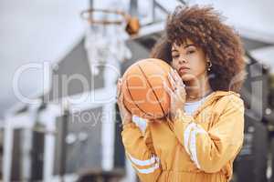 Cool basketball player with funky, confident and hipster attitude ready for game, fun or playing outdoor sports match. Portrait of young, fashion and beautiful black woman with afro ready for fitness