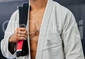 . Blackbelt karate, taekwondo body martial arts master and experienced fighter teaches self defense in dojo close up. Fit, fitness trainer and strong teacher in fighting hand techniques and training.