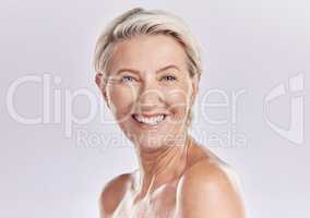 Skincare of senior woman in a beauty face portrait for hygiene, body care and cosmetic treatment on studio background. Happy anti aging senior model with big smile for wrinkle free skin care routine