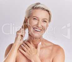 Grooming, hygiene and hair care for a mature woman brush and style grey hair, smiling and happy. Portrait of a senior female enjoying selfcare and treatment, pamper session against pink background