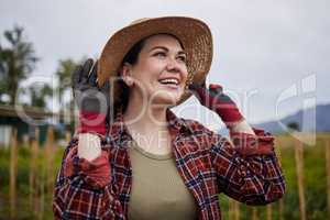 Happy agriculture farmer woman on farm checking clouds sky for outdoor farming, gardening and countryside living. Sustainability worker on a grass field looking at weather with smile for crops growth