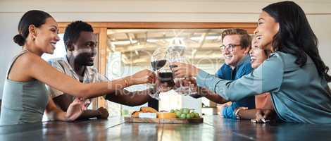 Friends, wine tasting and toasting alcohol with drinking glasses in restaurant on farm, winery estate or countryside distillery. Diversity, bonding or happy men and women enjoying vineyard red merlot