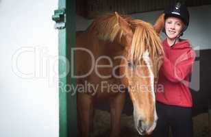 Isnt he a beaut. a teenage girl bonding with her horse.