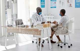 Covid, healthcare office and doctor with patient talking or healthcare communication for a medical note at her gp appointment or checkup. Black woman with health insurance visiting hospital or clinic