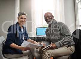 Our finances are just as they should be. a senior couple working on their finances at home.