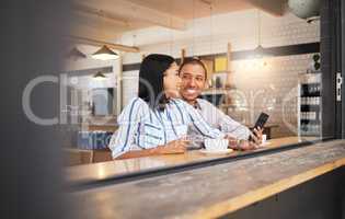 Couple phone selfie, love and cafe date in coffee shop or restaurant and bonding, enjoying free time or smiling. Happy, romantic or cheerful man and woman sitting together and meeting from dating app