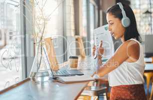 Laptop conference, workshop meeting or training on online zoom call in cafe, restaurant or coffee shop. Remote freelance woman with paper report on video conference education, presentation or webinar