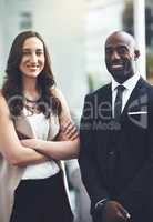 Proud of where weve taken our business. Portrait of a group of businesspeople standing in an office.