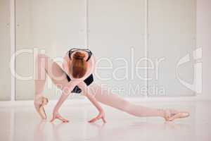 Art, ballet and creative ballerina dancing in a modern dance studio. Female classical dancer doing gymnastic training for a show. Elegant, fit and artistic athlete practicing her craft for a concert.