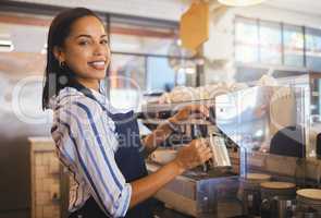 Barista preparing drink in coffee shop, cafe startup and hospitality restaurant. Portrait of friendly waitress, happy bistro worker and young woman steaming milk for hot cappuccino and waiter service