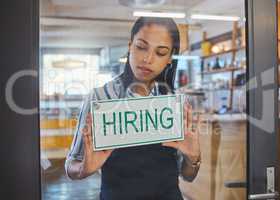 Hiring, recruitment and about us advertising sign on a glass door of a small business, startup or coffee shop. Cafe store, restaurant or hr manager ready to hire new workers, employees and staff