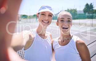 Selfie taking team of female tennis players on the court after a game, match or tournament portrait. Fit sporty teammates, athletes or professionals relax after being active, exercise and training