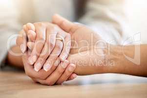 .Married couple hands for loving trust and empathy or support. Husband being understanding for wife infertility show love, help or hope. Man feeling compassion, kindness and affection for partner.