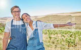 Grape farm, vineyard and farmer couple with proud, welcome and success portrait showing their small business in countryside or agriculture industry. Sustainable farming people with nature background