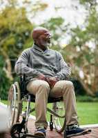 Enjoying the scenery. Full length shot of a handsome senior man sitting in his wheelchair outside.
