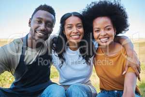 Diversity, black afro friends hugging, bonding and smile together outside. Happy group of people enjoying vacation and having fun during summer with friendship on their holiday and nature travel