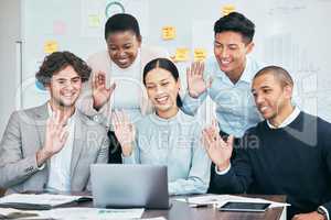 Businesspeople, team or group of professionals, waving and greeting during a video conference and virtual meeting on a laptop. Diverse employees of b2b advertising and marketing agency saying hello