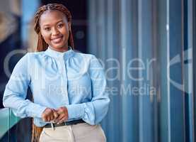 Corporate business woman standing on balcony outside at work, taking a break and looking confident. Portrait of a professional, smiling and cheerful black female manager expressing leadership