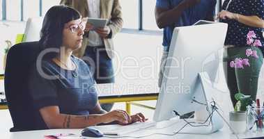 Hard work is its own reward. an attractive young businesswoman working on her computer in the office.