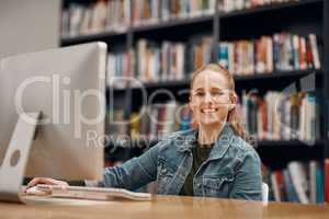 When finals come around, Ill be ready. Cropped portrait of a young female university student studying in the library.