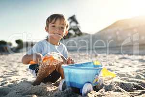 Let them explore as much as much as they can. an adorable little boy having fun at the beach.