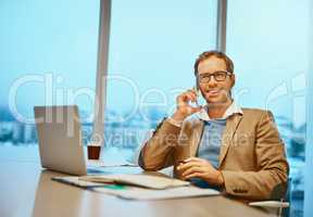 Its always a pleasure to hear from you. a handsome male designer working at his desk in the office.