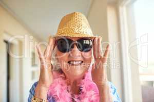 Retirement doesnt need to be boring. a senior woman at home.