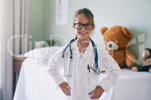 Mt future career excites me. an adorable little girl dressed as a doctor.