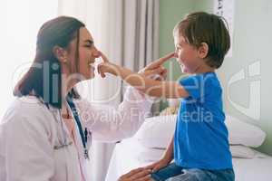 Personality is as important as knowledge and expertise. a little boy visiting the doctor.