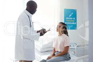 Medical, worker and doctor consulting a patient for health and wellness and writing diagnosis at the hospital. Healthcare man working on insurance, paper or checklist for woman at a clinic.