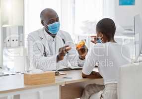 Doctor talking to covid patient of pills or medication in a hospital or clinic. Trust, help and expert advice on healthcare insurance and gp doc consulting with prescription product and face mask