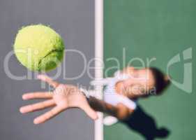 Tennis ball, sports and female player throwing and serving on a court outside from above. Athletic woman playing game for competitive fun with copy space. Sporty woman preparing for a game