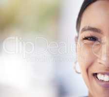 Half face portrait of a young woman with beautiful, smooth and clear skin with copy space. Closeup of a happy girl with glowing skin after a facial spa treatment for wellness, bodycare and skincare.