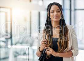 Ive found the perfect place for me. Cropped portrait of an attractive young female designer standing in her office.