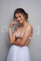 If you like it, wear it. Portrait of a beautiful young woman posing in studio while wearing a bra and ballet skirt.