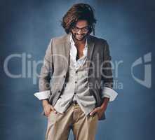 Ive always upheld my optimistic mind. Studio shot of a handsome young man posing against a grey background.