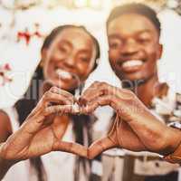 Heart hands, emoji and love of couple smile, happy and showing kindness, trust and support. Closeup of young black people together in romantic relationship celebrate honeymoon with with content bond